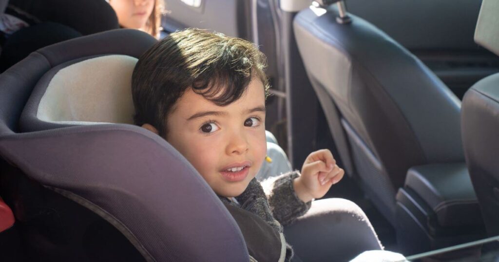 young child in forward-facing car seat